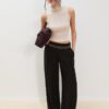 Pantalones de lyocell con pinzas y cadena Pantalones de lyocell con pinzas y cadena
