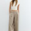 Pantalones de lyocell con pinzas y cadena Pantalones de lyocell con pinzas y cadena
