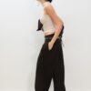 Pantalones de lyocell con pinzas y cadena Pantalones de lyocell con pinzas y cadena