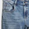 Pantalones de mezclilla de tiro bajo con bajo acampanado Pantalones de mezclilla de tiro bajo con bajo acampanado
