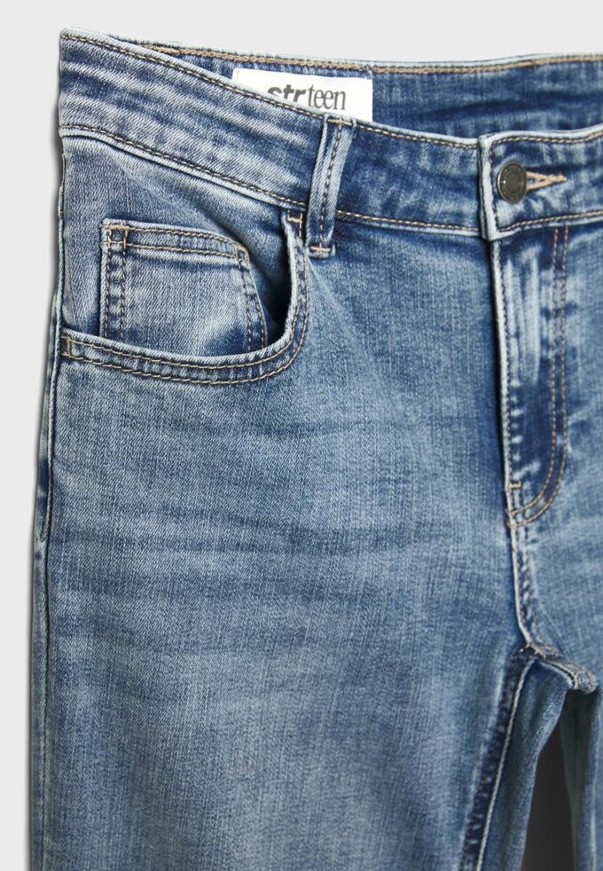 Pantalones de mezclilla de tiro bajo con bajo acampanado Pantalones de mezclilla de tiro bajo con bajo acampanado
