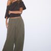Pantalones de popelín de corte acampanado con topes Pantalones de popelín de corte acampanado con topes