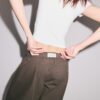 Pantalones de popelín de corte acampanado con topes Pantalones de popelín de corte acampanado con topes