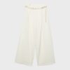 Pantalones de satén con detalle de cadena Pantalones de satén con detalle de cadena