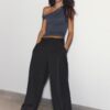 Pantalones elegantes de corte recto con pinzas