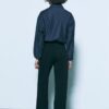Pantalones elegantes de corte recto y vuelo con cinturón Pantalones elegantes de corte recto y vuelo con cinturón