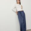 Pantalones fluidos con efecto arrugado y lazo Pantalones fluidos con efecto arrugado y lazo