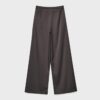Pantalones fluidos con efecto arrugado y lazo Pantalones fluidos con efecto arrugado y lazo