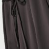 Pantalones fluidos con efecto arrugado y lazo Pantalones fluidos con efecto arrugado y lazo