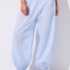 Pantalones globo con cintura doblada Pantalones globo con cintura doblada