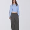 Pantalones holgados elegantes con detalle de costuras Pantalones holgados elegantes con detalle de costuras