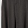 Pantalones holgados elegantes con detalle de costuras Pantalones holgados elegantes con detalle de costuras