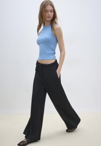 Pantalones jogger de pierna ancha y tacto suave con detalle de costura delantera