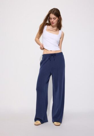 Pantalones jogger de pierna ancha y tacto suave con detalle de costura delantera