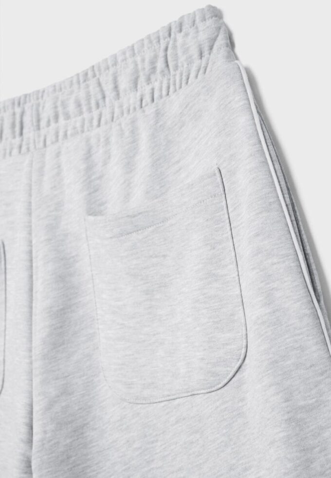 Pantalones Wide Leg de felpa con detalle de ribete Pantalones Wide Leg de felpa con detalle de ribete