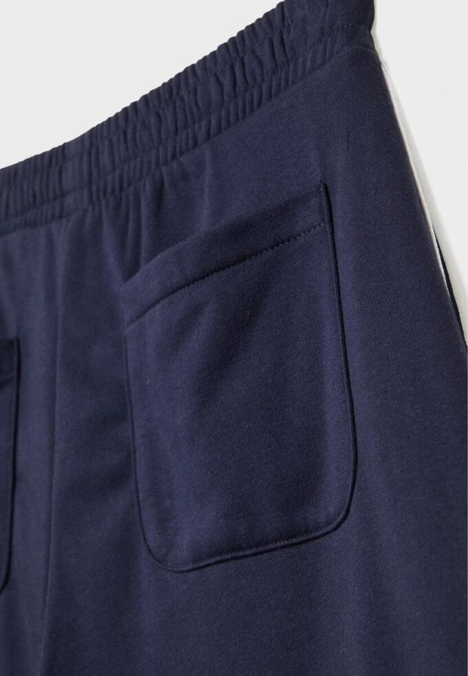 Pantalones Wide Leg de felpa con detalle de ribete Pantalones Wide Leg de felpa con detalle de ribete