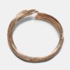 Pulsera rígida con hilos metalizados