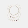 Set de 3 collares con múltiples dijes