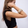 Set de 3 pulseras rígidas con tachuelas