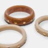Set de 3 pulseras rígidas con tachuelas
