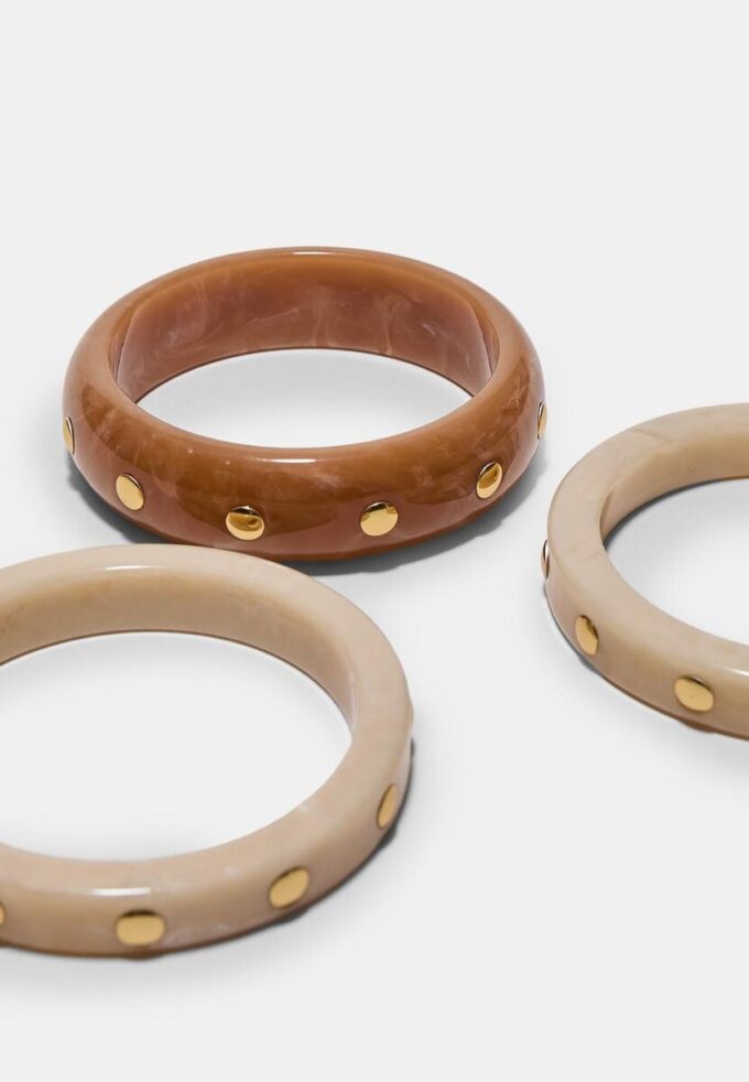 Set de 3 pulseras rígidas con tachuelas