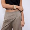 Set de 3 pulseras rígidas con tachuelas