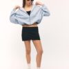 Sudadera bomber con capucha estampada