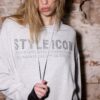 Sudadera con capucha y pedrería Sudadera con capucha y pedrería