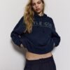 Sudadera con capucha y pedrería Sudadera con capucha y pedrería