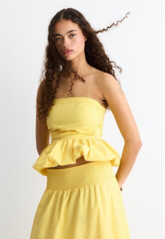 Top bustier con volantes