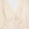 Top con cuello halter y ribete de encaje Top con cuello halter y ribete de encaje