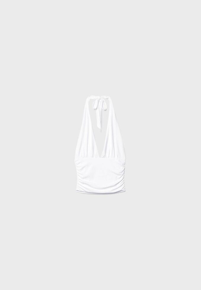 Top halter con lazo fruncido en el cuello Top halter con lazo fruncido en el cuello