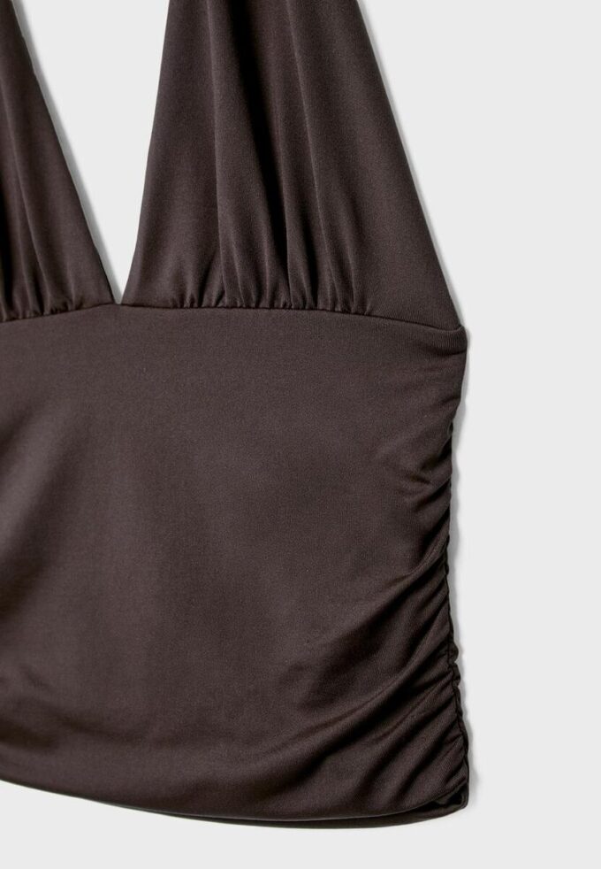 Top halter con lazo fruncido en el cuello Top halter con lazo fruncido en el cuello