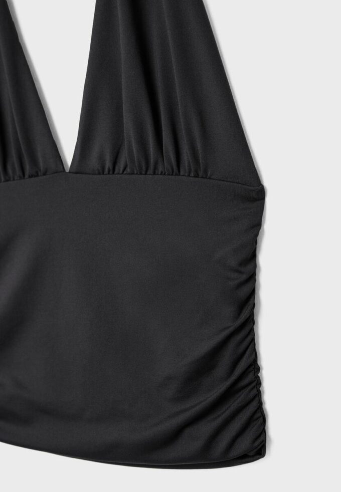 Top halter con lazo fruncido en el cuello Top halter con lazo fruncido en el cuello