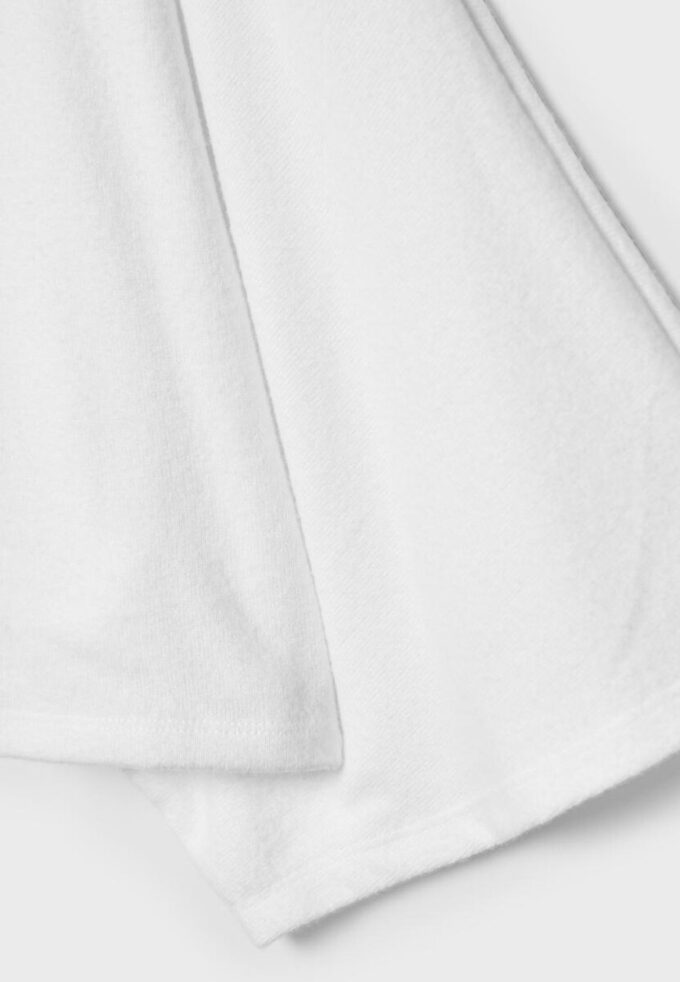 Tops tipo capa con cuello barco Tops tipo capa con cuello barco