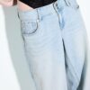 Vaqueros de talle bajo con doble botón Vaqueros de talle bajo con doble botón