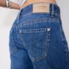 Vaqueros de talle bajo con doble botón Vaqueros de talle bajo con doble botón