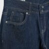 Vaqueros de talle bajo con doble botón Vaqueros de talle bajo con doble botón