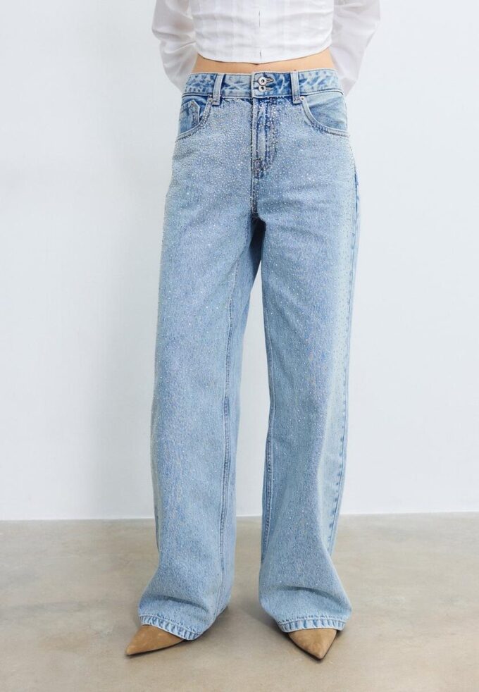 Vaqueros de talle bajo y pierna Wide Leg con pedrería Vaqueros de talle bajo y pierna Wide Leg con pedrería