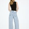 Vaqueros de talle bajo y pierna Wide Leg con pedrería Vaqueros de talle bajo y pierna Wide Leg con pedrería
