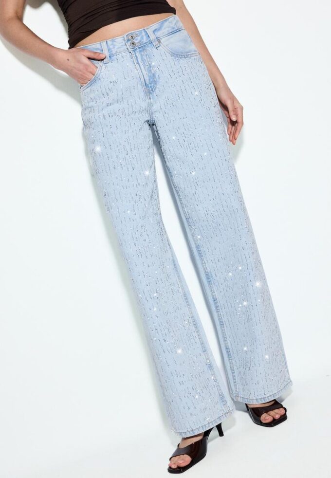 Vaqueros de talle bajo y pierna Wide Leg con pedrería Vaqueros de talle bajo y pierna Wide Leg con pedrería
