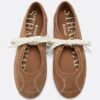 Zapatillas de piel con lazo