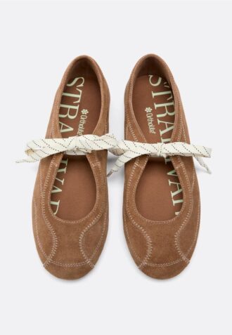 Zapatillas de piel con lazo