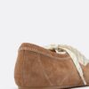 Zapatillas de piel con lazo