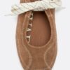Zapatillas de piel con lazo
